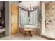 Bathroom featuring a soaking tub with glass block windows and a tiled shower at 10955 E Vista Del Cielo Rd, Gold Canyon, AZ 85118