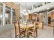 Bright dining area with a view to an open kitchen and decorative accents at 10955 E Vista Del Cielo Rd, Gold Canyon, AZ 85118