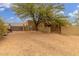 View of the driveway and gated entrance with desert landscaping around the property at 10955 E Vista Del Cielo Rd, Gold Canyon, AZ 85118