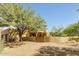 A Southwestern-style home featuring desert landscaping and a tiled roof at 10955 E Vista Del Cielo Rd, Gold Canyon, AZ 85118