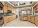 Bright kitchen with ample cabinetry, granite countertops, and modern appliances at 10955 E Vista Del Cielo Rd, Gold Canyon, AZ 85118