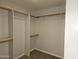 Walk-in closet with shelving and hanging rods for organized storage at 1119 E Southshore Dr, Gilbert, AZ 85234