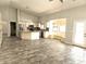 Open-concept kitchen featuring granite countertops, stainless steel appliances, and tile flooring at 1119 E Southshore Dr, Gilbert, AZ 85234