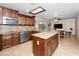 Gourmet kitchen with granite countertops and a center island at 11820 S Half Moon Dr, Phoenix, AZ 85044