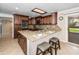 Well-equipped kitchen with stainless steel appliances and granite counters at 11820 S Half Moon Dr, Phoenix, AZ 85044