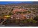 Aerial view of an expansive estate with a pool, basketball court, and lush landscaping at 12980 E Cochise Rd, Scottsdale, AZ 85259