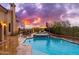 Inviting backyard with a pool, hot tub, and outdoor seating area, perfect for entertaining at 12980 E Cochise Rd, Scottsdale, AZ 85259