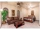 Cozy bedroom featuring comfortable seating area, carpet floor and ceiling fan at 12980 E Cochise Rd, Scottsdale, AZ 85259