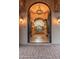 Grand foyer with arched entryways, tile flooring, and a view into a luxurious living space at 12980 E Cochise Rd, Scottsdale, AZ 85259