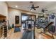 Home gym featuring a treadmill, free weights, and a stunning view of the outdoors at 14371 E Kalil Dr, Scottsdale, AZ 85259