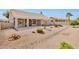 This home features a low-maintenance backyard with desert landscaping, perfect for enjoying the Arizona climate at 14936 W Yosemite Dr, Sun City West, AZ 85375