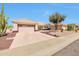 Well-maintained home with two-car garage, complemented by desert landscaping and a sunny, welcoming atmosphere at 14936 W Yosemite Dr, Sun City West, AZ 85375