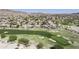 Breathtaking aerial shot showcases a lush golf course meandering through a community with beautiful homes and scenic views at 16008 S 13Th Way, Phoenix, AZ 85048