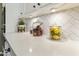 Bright kitchen counter features white cabinets, quartz countertops, and a subway tile backsplash at 16008 S 13Th Way, Phoenix, AZ 85048