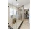 Glass enclosed shower in the main bathroom, with a tiled floor and a convenient built-in niche at 16008 S 13Th Way, Phoenix, AZ 85048