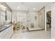 Spa like main bathroom featuring a glass enclosed shower, and modern fixtures at 16008 S 13Th Way, Phoenix, AZ 85048