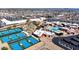 Aerial view of community amenities featuring tennis courts, pools, and recreational areas for active living at 16014 W Kino Dr, Surprise, AZ 85374