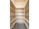 Walk-in pantry offering ample storage space with multiple shelves at 17768 W Maui Ln, Surprise, AZ 85388