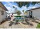 Inviting backyard with a mosaic hot tub and lounging area, perfect for outdoor relaxation and entertaining at 17801 N 43Rd Way, Phoenix, AZ 85032