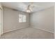 Bright bedroom with neutral carpet, ceiling fan, and one window providing natural light at 17801 N 43Rd Way, Phoenix, AZ 85032