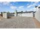 Spacious paved driveway leading to a multi-car garage in a well-maintained home exterior at 17801 N 43Rd Way, Phoenix, AZ 85032