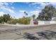 Charming home exterior with desert landscaping and a privacy wall at 17801 N 43Rd Way, Phoenix, AZ 85032