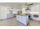 Bright kitchen with white cabinets, a butcher block island, stainless steel appliances, and recessed lighting at 17801 N 43Rd Way, Phoenix, AZ 85032