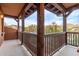 A spacious balcony with decorative wood beams offering a pleasant outdoor retreat at 17902 N 93Rd Way, Scottsdale, AZ 85255