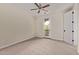 Bedroom with carpet and door leading to a balcony and view at 17902 N 93Rd Way, Scottsdale, AZ 85255