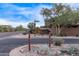 Attractive community sign with mature desert landscaping at 17902 N 93Rd Way, Scottsdale, AZ 85255