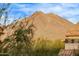 Beautiful mountain view with a glimpse of a red tile roof at 17902 N 93Rd Way, Scottsdale, AZ 85255