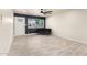 Cozy living room with modern tile floors and bright natural light from the front window at 1827 E Jarvis Ave, Mesa, AZ 85204