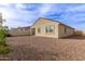 Wide backyard features low-maintenance gravel landscaping at 18621 W Hackamore Dr, Surprise, AZ 85387