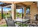 Inviting outdoor patio with stylish seating beneath a shady pergola at 20780 N Gardenia Rd, Maricopa, AZ 85138