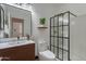 Stylish bathroom offers a modern vanity, a walk-in shower with black trim, and sleek fixtures at 21266 E Via De Olivos --, Queen Creek, AZ 85142