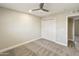 A good sized bedroom featuring carpet and a closet at 2530 E Randall Dr, Tempe, AZ 85288