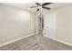 A good sized bedroom featuring carpet and a ceiling fan at 2530 E Randall Dr, Tempe, AZ 85288