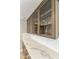 This is a kitchen featuring white backsplash and quartz countertop and beautiful cabinetry at 2530 E Randall Dr, Tempe, AZ 85288