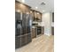 Modern kitchen showcasing stainless steel appliances and elegant wood cabinetry at 2530 E Randall Dr, Tempe, AZ 85288