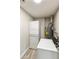 Functional laundry room with washer, dryer, and water heater at 2530 E Randall Dr, Tempe, AZ 85288