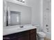 Bathroom featuring a shower-tub combo and a vanity with plenty of counter space at 2540 E Atlanta Ave, Phoenix, AZ 85040