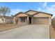 Charming single-story home featuring a two-car garage and a well-maintained front yard at 2540 E Atlanta Ave, Phoenix, AZ 85040