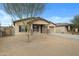 Charming single-story home showcasing desert landscaping and a two-car garage at 2540 E Atlanta Ave, Phoenix, AZ 85040