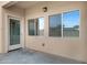 Covered patio with exterior door, providing shade and access to the outdoors at 2540 E Atlanta Ave, Phoenix, AZ 85040