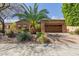 Front exterior showcasing the landscaped yard, brick accents, and a paver driveway at 29390 N 128Th Ln, Peoria, AZ 85383