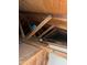 View of the attic's wooden beams and some wiring which provides the structural integrity and utilities of the home at 3452 E Evans Dr, Phoenix, AZ 85032