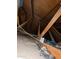 This attic's wooden beams offer a look at the bones of the home with its electrical wiring and insulation at 3452 E Evans Dr, Phoenix, AZ 85032