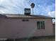 Home exterior featuring a well-maintained roof, neutral paint and an air conditioning unit on the roof at 3452 E Evans Dr, Phoenix, AZ 85032