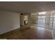 View of the spacious living room showcasing open floor plan and hardwood flooring at 3452 E Evans Dr, Phoenix, AZ 85032