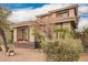 Home exterior with desert landscaping, a tile roof, and a front window at 3588 S 257Th Ave, Buckeye, AZ 85326